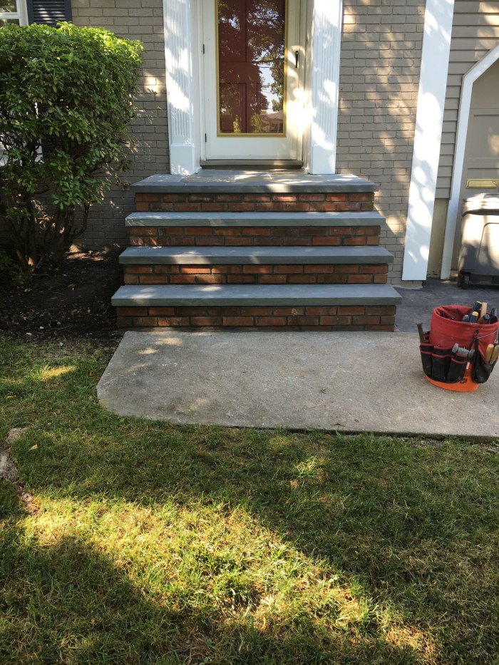 The end result of re doing and fixing new concrete steps