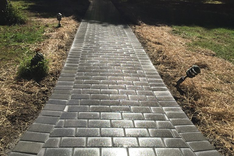NJ's best mason contractor designs and builds a new paver walkway for another happy customer.