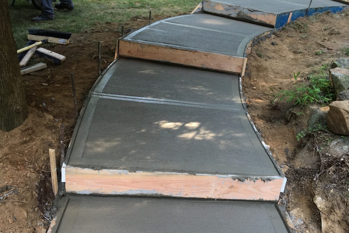 Concrete walkways are low-maintenance and extremely durable.