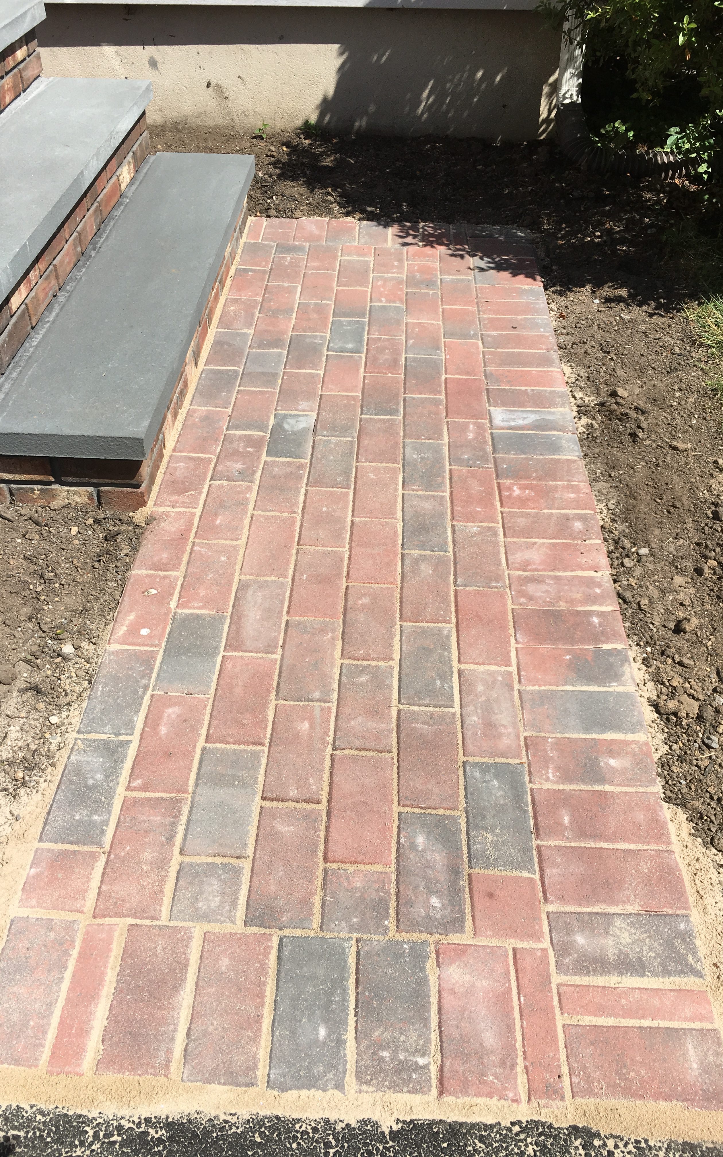 We use all types of stones to make beautiful walkways. This one is made out of brick.